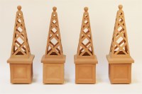 Lot 298 - A set of four modern terracotta obelisks