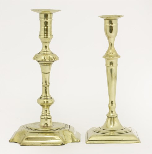 Lot 126 - Two brass candlesticks