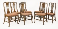 Lot 1705A - A collection of seven Queen Anne-style walnut dining chairs