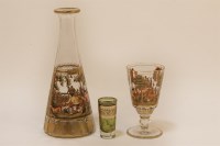 Lot 1157 - A bohemian enamelled glass decanter and goblet