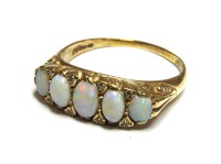 Lot 41 - A five stone opal ring