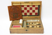 Lot 141 - A pine cased games box