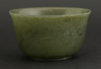 Lot 111 - A spinach-green jade Bowl
