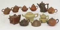 Lot 80 - A collection of twelve small Yixing teapots and covers
