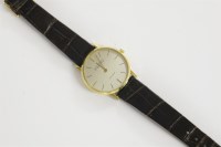 Lot 70 - A gentleman's gold plated Girard Perregaux quartz strap watch