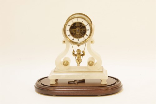 Lot 197 - An alabaster mantel clock