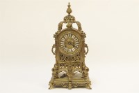 Lot 205 - A pierced brass mantel clock