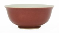Lot 64 - A copper-red bowl