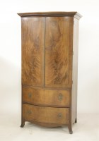 Lot 2184 - A regency design mahogany bow fronted wardrobe