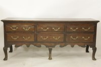 Lot 2197 - A George III oak dresser base