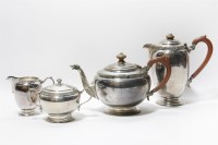 Lot 121 - A silver four piece tea set