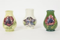 Lot 162 - Three Moorcroft bud vases