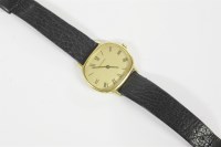Lot 58 - A gentleman's gold plated Garrard mechanical strap watch