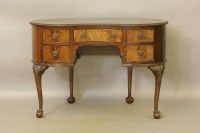 Lot 454 - A mahogany kidney shaped desk