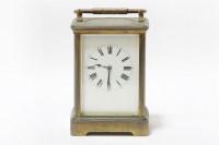 Lot 145 - A brass carriage clock