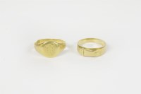 Lot 17 - A 22ct gold signet ring and a gold buckle ring