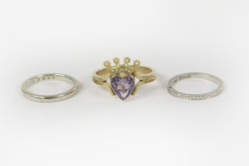 Lot 38 - A gold single stone amethyst heart and split pearl stick pin later converted to a ring