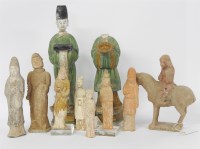 Lot 275 - A group of Chinese terracotta tomb figures