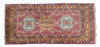 Lot 422 - A Chinese carpet