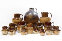 Lot 221 - Fifteen various salt glazed stoneware Harvest jugs