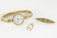 Lot 27 - A ladies 9ct gold mechanical bracelet watch