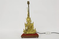 Lot 198 - A Thai Buddha figural lamp