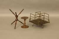 Lot 274 - A mahogany and brass table top revolving bookcase