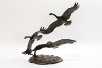 Lot 294 - A decorative bronze of Canada geese in flight