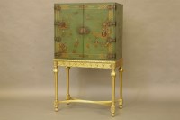 Lot 437 - A chinoiserie cabinet on stand