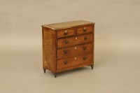 Lot 439 - A rosewood miniature chest of drawers