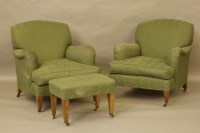 Lot 498 - A pair of modern green upholstered Howard style armchairs by Beaumont and Fletcher each with matching footstool 76cm x 82 x 85