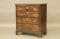 Lot 435 - An 18th century oak country made chest of four graduated drawers