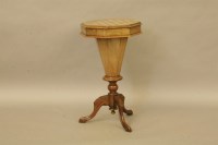 Lot 446 - A Victorian walnut trumpet worktable