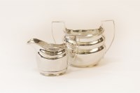 Lot 120 - A Georgian silver cream jug and sugar bowl