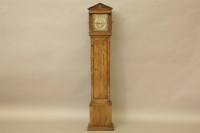 Lot 475 - A Westminster chiming oak cased Grandmother clock