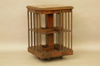 Lot 385 - An Edwardian strung and inlaid revolving bookcase