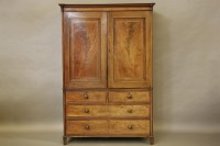 Lot 387 - A George IV mahogany and satinwood inlaid linen press