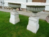 Lot 3077 - A pair of shallow cast metal and white painted campana urns on stands