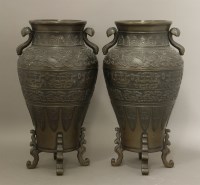 Lot 253 - A pair of bronze vases