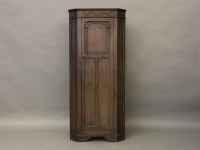 Lot 498A - An oak floor standing corner cabinet