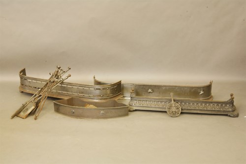 Lot 300 - A quantity of fenders and fire irons