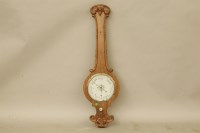 Lot 319 - A Victorian rosewood wheel barometer