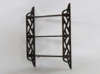 Lot 1760 - An oak wall shelf