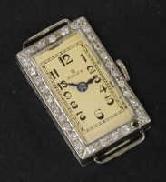 Lot 15 - A ladies 18ct white gold Rolex Prima diamond set mechanical cocktail watch