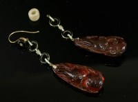 Lot 43 - A pair of gold Art Deco carved amber diamond and enamel drop earrings