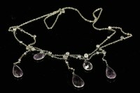Lot 143 - A platinum Belle Epoque amethyst and diamond swag necklace