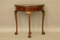 Lot 375 - A modern George III style D shaped fold over card table