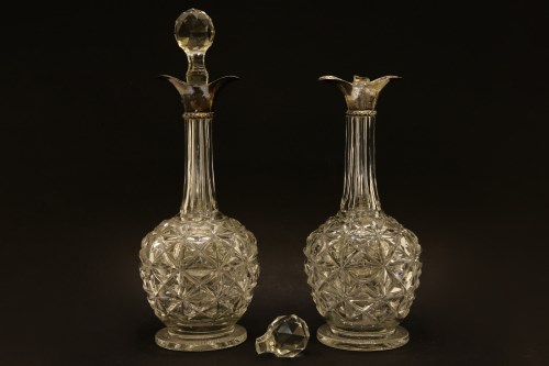 Lot 139 - A pair of silver mounted decanters