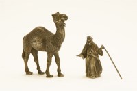 Lot 132 - A continental silver camel and Arab master