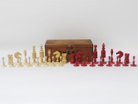 Lot 45A - A 19th century carved ivory chess set